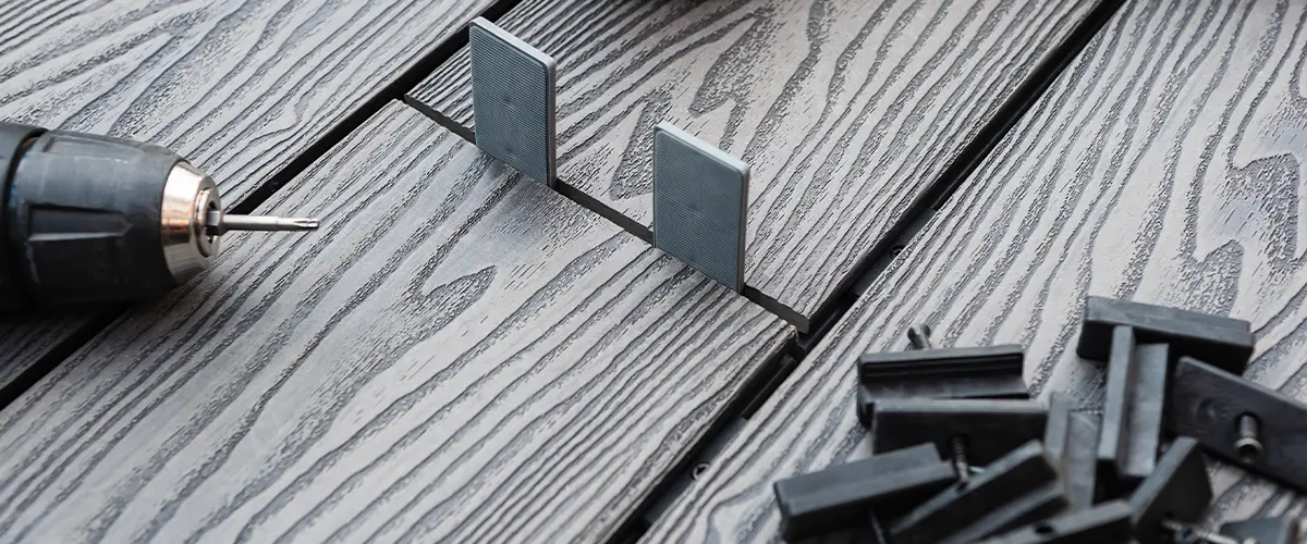 The best decking material on the market in a slate gray color with spacers and fasteners