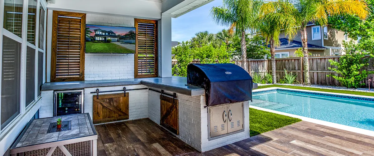 outdoor kitchen deck design with swimming pool