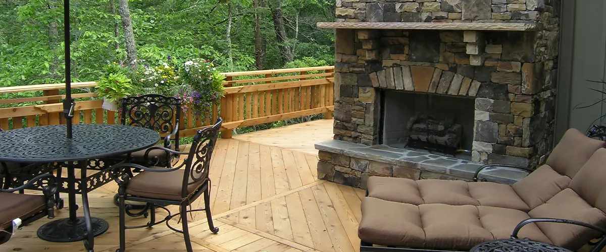 wooden deck with fireplace