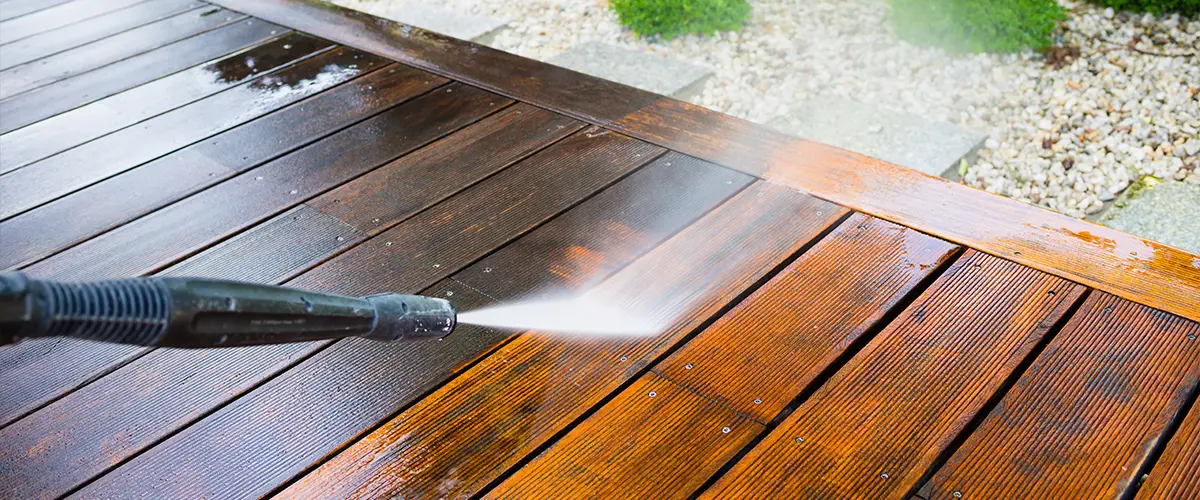 Pressure washing a composite decking surface